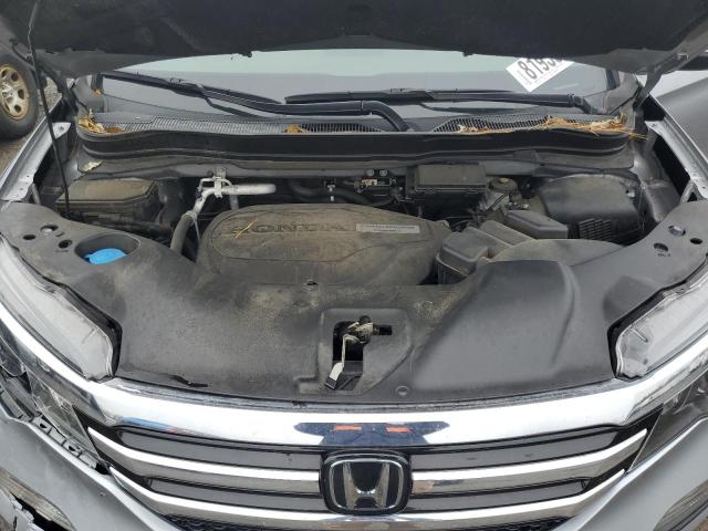 Photo 12 from auction – 2017 HONDA PILOT ELIT with VIN 5FNYF6H00HB015412