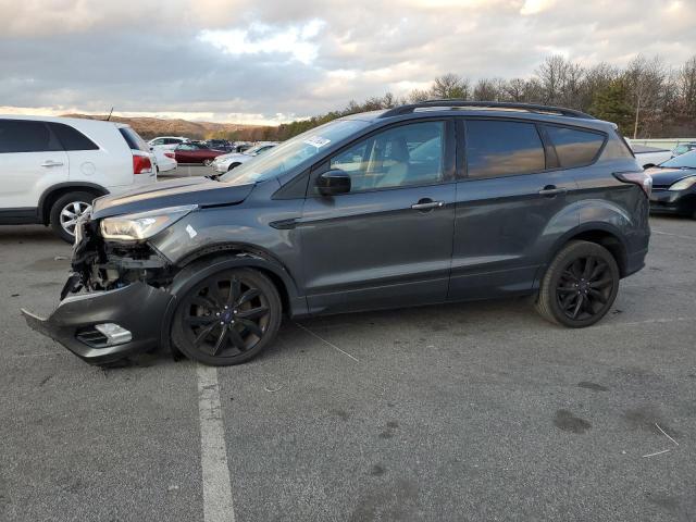 FORD ESCAPE SE 2018 with VIN 1FMCU9GD3JUA46457 - Photo from auction