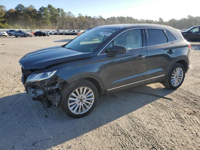 LINCOLN MKC 2019 with VIN 5LMCJ1C93KUL22890 - Photo from auction