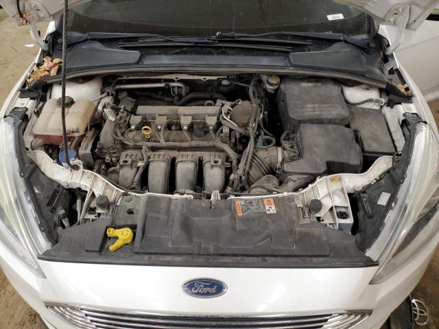 Photo 11 from auction – 2015 FORD FOCUS TITA with VIN 1FADP3N29FL324201