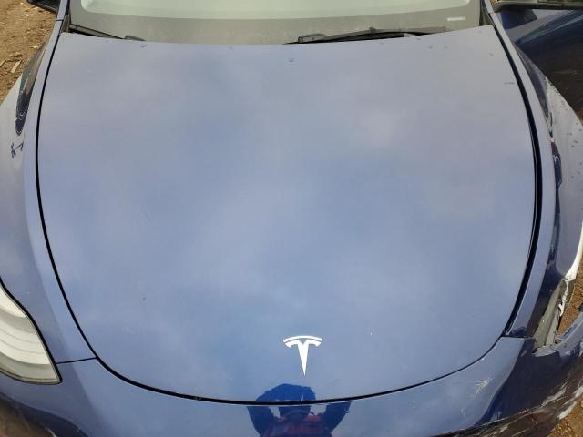 Photo 11 from auction – 2023 TESLA MODEL Y with VIN 7SAYGDEE7PF703927