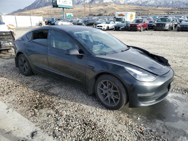 Снимка 4 от търг – 2022 TESLA MODEL 3 с VIN 5YJ3E1EB5NF125535