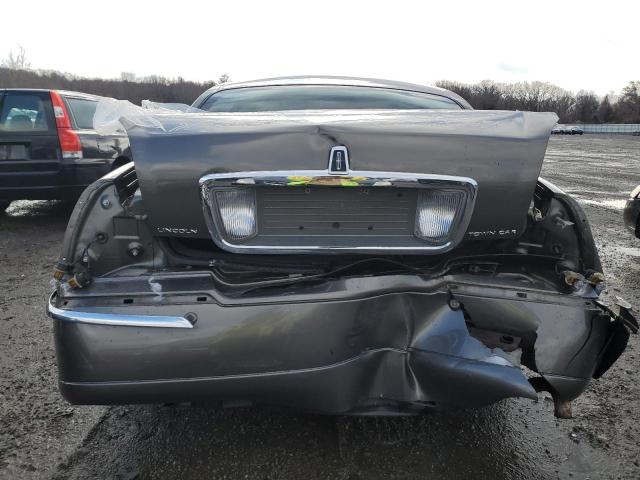Photo 6 from auction – 2004 LINCOLN TOWN CAR U with VIN 1LNHM83W74Y673652
