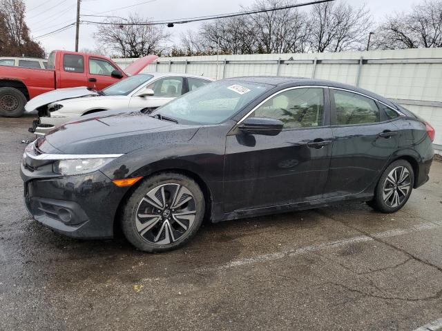 HONDA CIVIC EX 2018 with VIN JHMFC1F38JX039922 - Photo from auction