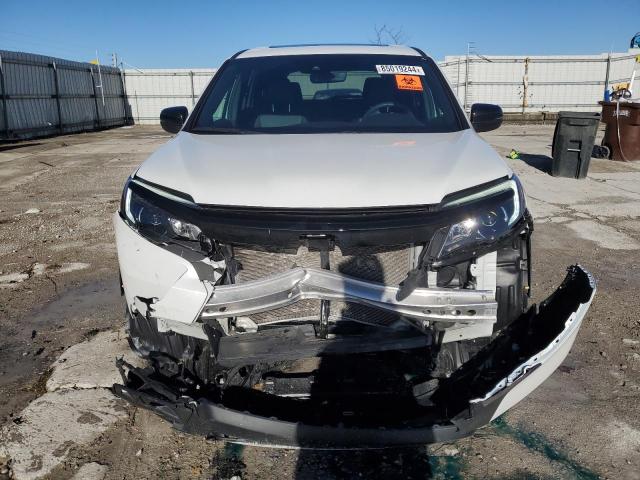 Photo 5 from auction – 2021 HONDA PASSPORT E with VIN 5FNYF8H5XMB011904