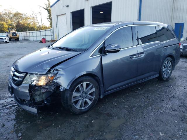 HONDA ODYSSEY TO 2014 with VIN 5FNRL5H91EB032852 - Photo from auction