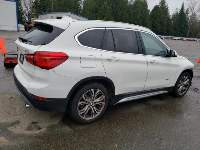 Photo 3 from auction – 2017 BMW X1 XDRIVE2 with VIN WBXHT3C34H5F71142