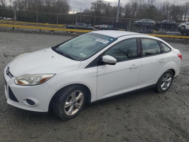 FORD FOCUS SE 2014 with VIN 1FADP3F20EL368875 - Photo from auction