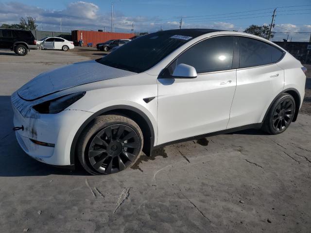 TESLA MODEL Y 2022 with VIN 7SAYGAEE2NF548618 - Photo from auction