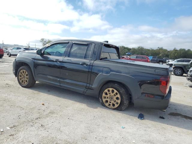 Photo 2 from auction – 2022 HONDA RIDGELINE with VIN 5FPYK3F12NB001763