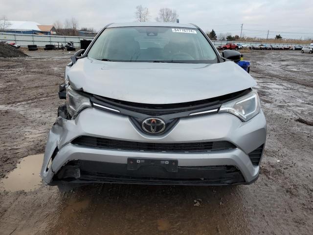 Photo 5 from auction – 2018 TOYOTA RAV4 LE with VIN 2T3BFREV1JW784668