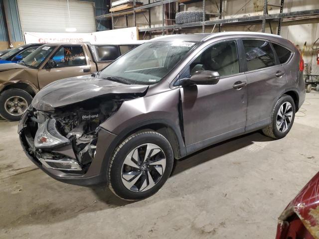 HONDA CR-V TOURI 2016 with VIN 5J6RM4H97GL105532 - Photo from auction