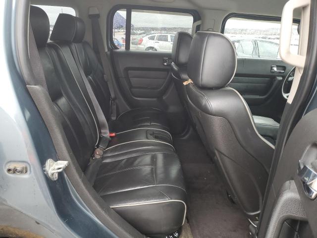 Photo 11 from auction – 2006 HUMMER H3 with VIN 5GTDN136168175028