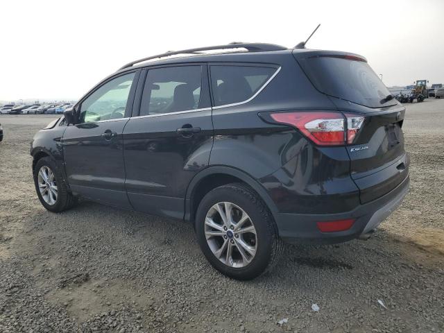Photo 2 from auction – 2018 FORD ESCAPE SEL with VIN 1FMCU0HD8JUA56539