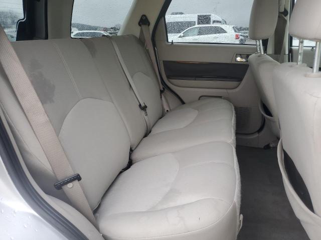 Photo 11 from auction – 2009 MERCURY MARINER with VIN 4M2CU91709KJ00211