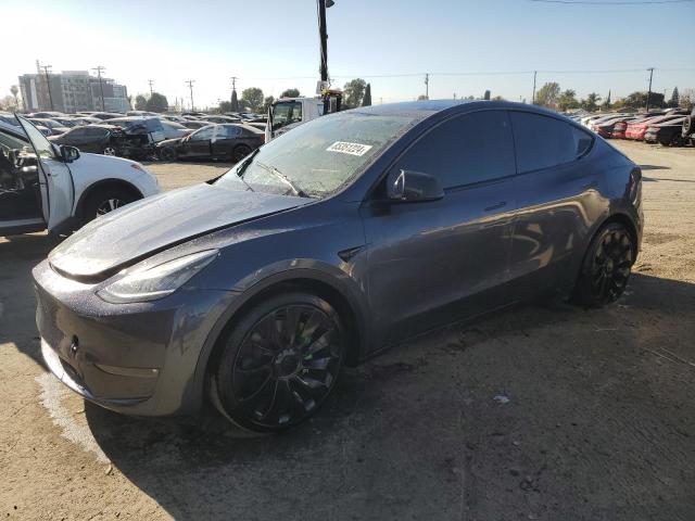 TESLA MODEL Y 2022 with VIN 7SAYGDEE1NF323513 - Photo from auction