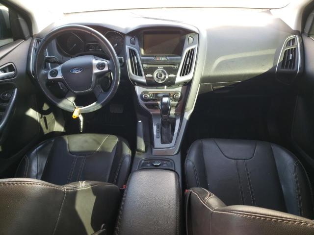 Photo 8 from auction – 2014 FORD FOCUS TITA with VIN 1FADP3J23EL460571