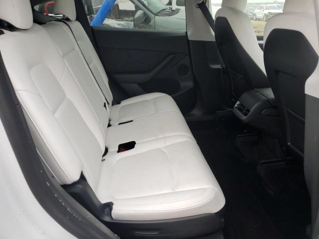 Photo 10 from auction – 2023 TESLA MODEL Y with VIN 7SAYGAEE8PF661282