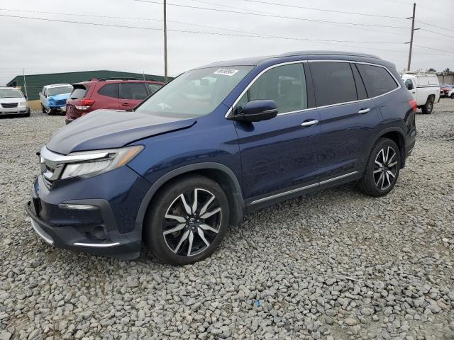 HONDA PILOT TOUR 2019 with VIN 5FNYF5H95KB004924 - Photo from auction