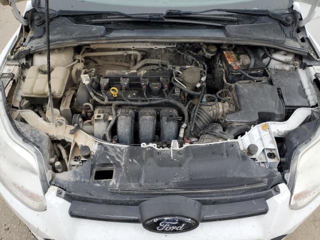 Photo 11 from auction – 2014 FORD FOCUS SE with VIN 1FADP3F23EL349611
