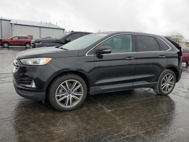 FORD EDGE TITAN 2021 with VIN 2FMPK4K90MBA09602 - Photo from auction