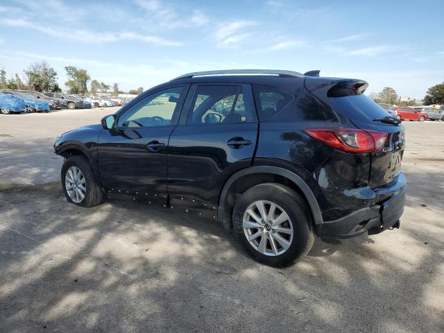 Photo 2 from auction – 2014 MAZDA CX-5 TOURI with VIN JM3KE2CY4E0305989