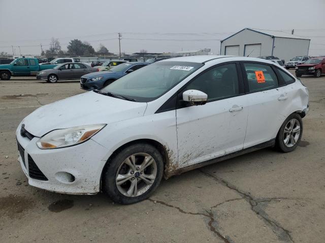 FORD FOCUS SE 2014 with VIN 1FADP3F23EL349611 - Photo from auction