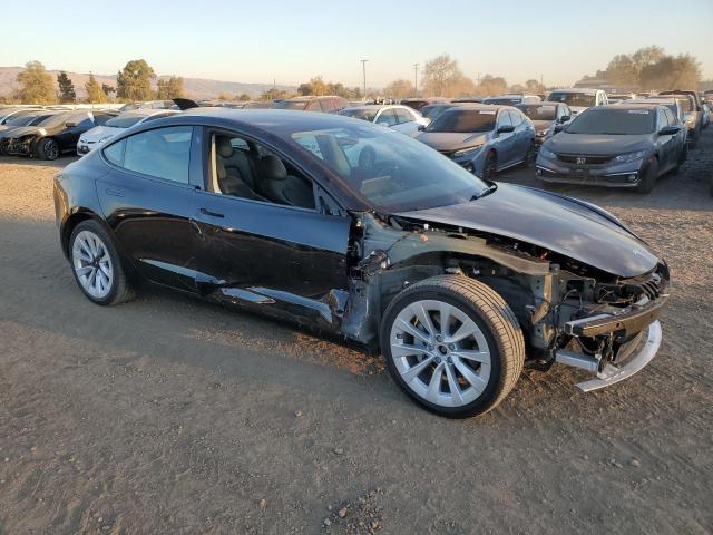 Photo 4 from auction – 2022 TESLA MODEL 3 with VIN 5YJ3E1EB0NF130660