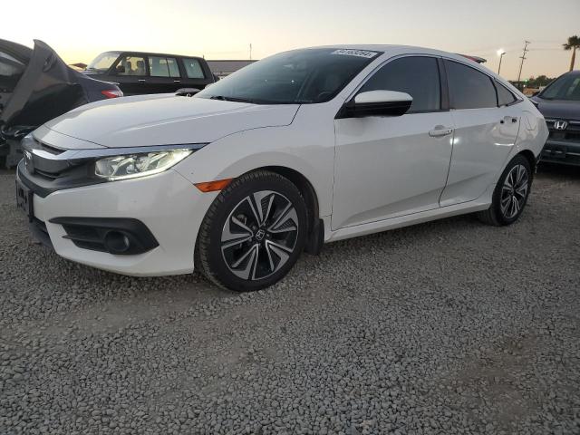 HONDA CIVIC EXL 2017 with VIN 2HGFC1F76HH631971 - Photo from auction
