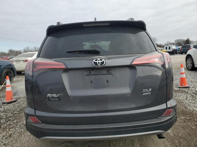 Photo 6 from auction – 2016 TOYOTA RAV4 XLE with VIN 2T3RFREV8GW450760