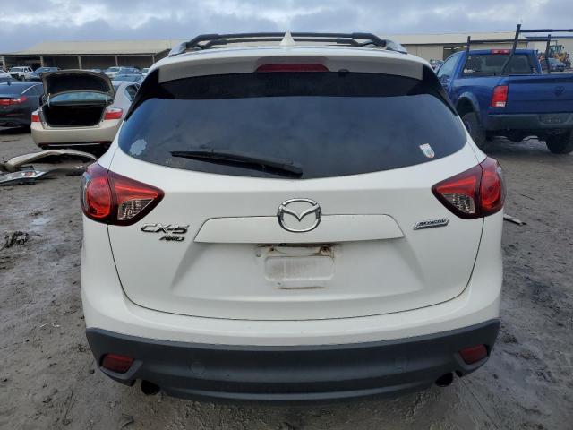 Photo 6 from auction – 2013 MAZDA CX-5 TOURI with VIN JM3KE4CE4D0141191