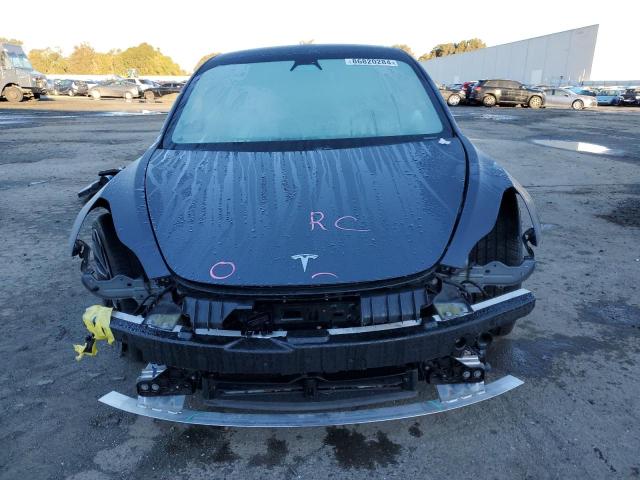 Photo 5 from auction – 2021 TESLA MODEL 3 with VIN 5YJ3E1EC4MF076688