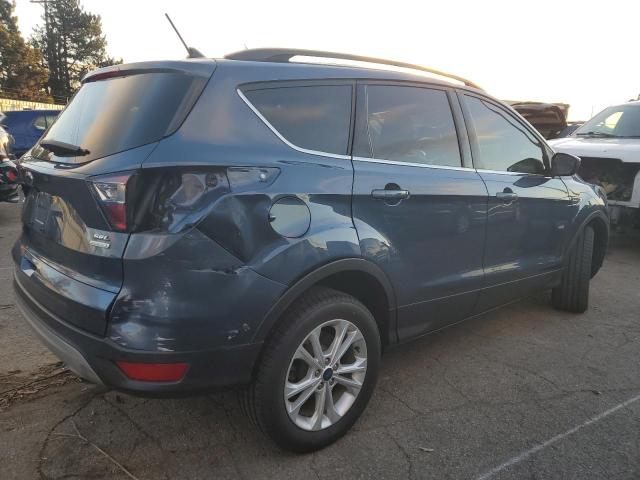 Photo 3 from auction – 2018 FORD ESCAPE SEL with VIN 1FMCU0HD7JUB09795