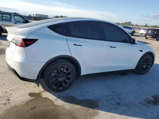 Photo 3 from auction – 2022 TESLA MODEL Y with VIN 7SAYGAEE2NF548618