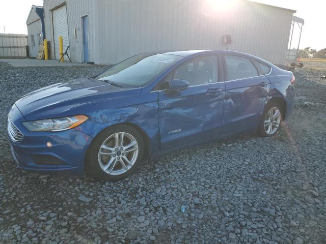FORD FUSION SE 2018 with VIN 3FA6P0LU1JR128386 - Photo from auction