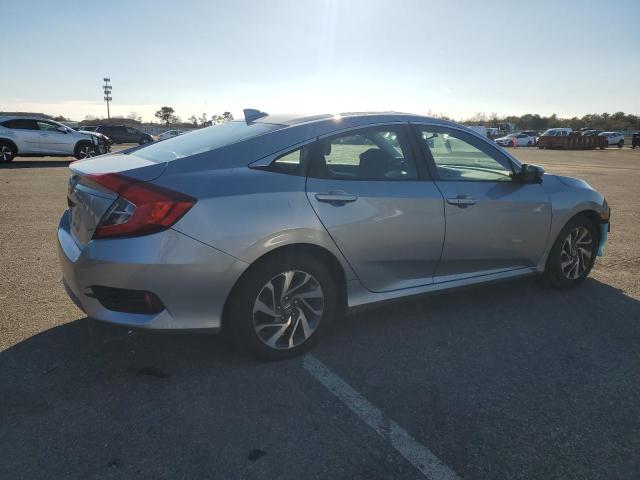 Photo 3 from auction – 2018 HONDA CIVIC EX with VIN 2HGFC2F73JH551846
