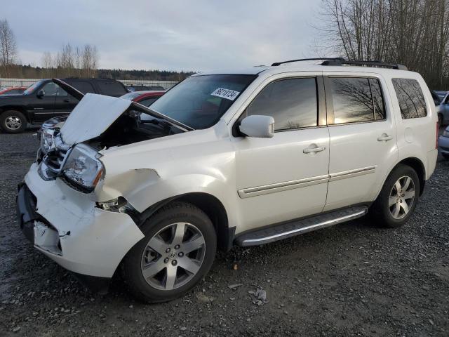 HONDA PILOT TOUR 2014 with VIN 5FNYF4H99EB015066 - Photo from auction