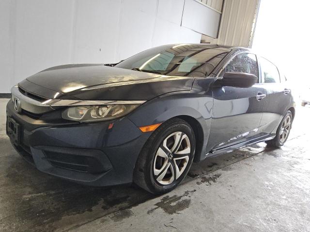 HONDA CIVIC LX 2017 with VIN 2HGFC2F52HH560871 - Photo from auction