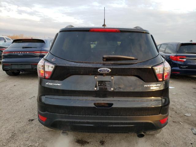 Photo 6 from auction – 2017 FORD ESCAPE TIT with VIN 1FMCU9J91HUE52249