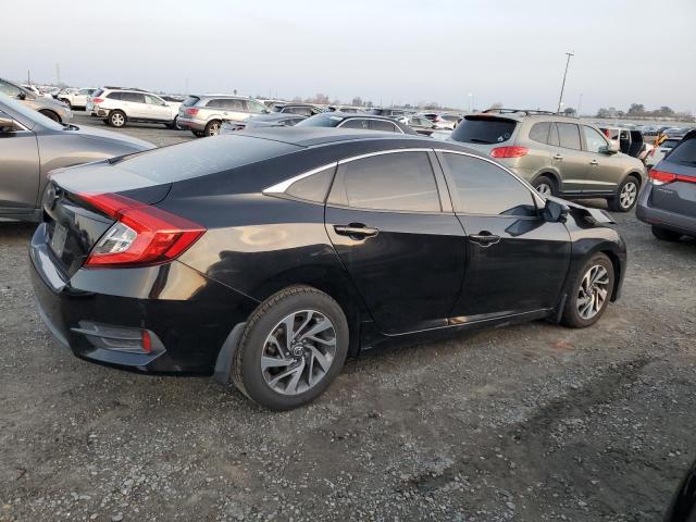 Photo 3 from auction – 2016 HONDA CIVIC EX with VIN 2HGFC2F70GH520269