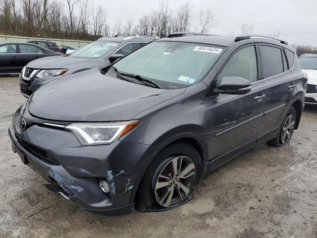 TOYOTA RAV4 XLE 2017 with VIN JTMRFREV3HJ164184 - Photo from auction