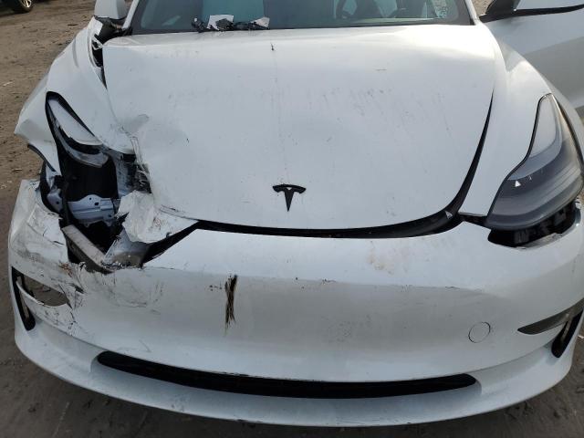 Photo 11 from auction – 2023 TESLA MODEL 3 with VIN 5YJ3E1ECXPF497481