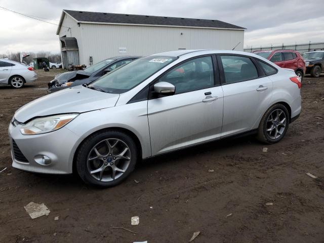 FORD FOCUS SE 2014 with VIN 1FADP3F23EL223619 - Photo from auction