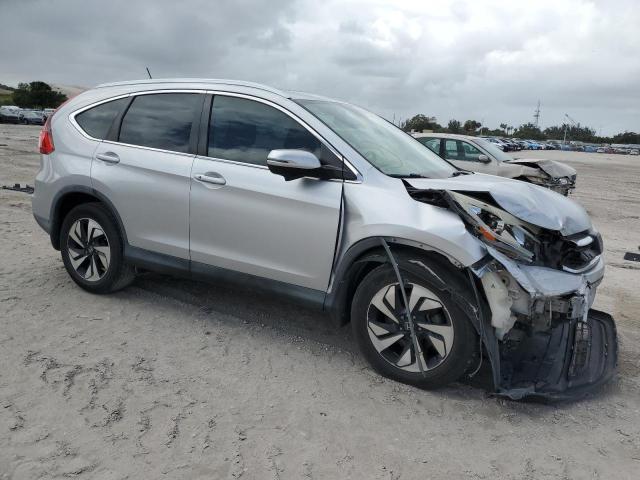 Photo 4 from auction – 2016 HONDA CR-V TOURI with VIN 5J6RM3H94GL014583