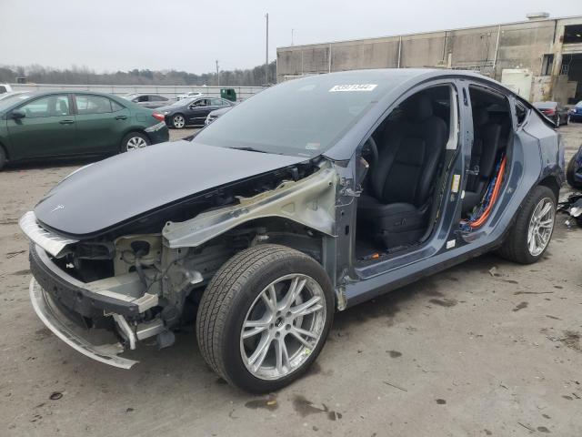 TESLA MODEL Y 2023 with VIN 7SAYGDEE7PF611264 - Photo from auction