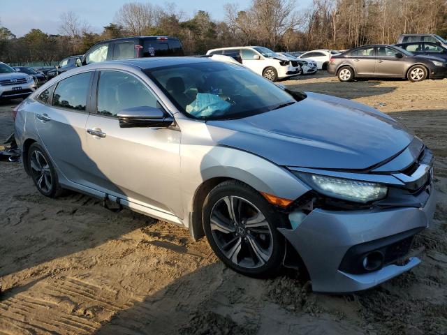 Photo 4 from auction – 2016 HONDA CIVIC 4D E with VIN 19XFC1F91GE219807