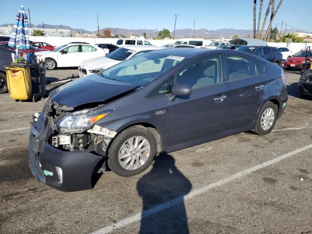 Снимка 1 от търг – 2014 TOYOTA PRIUS PLUG с VIN JTDKN3DPXE3061994