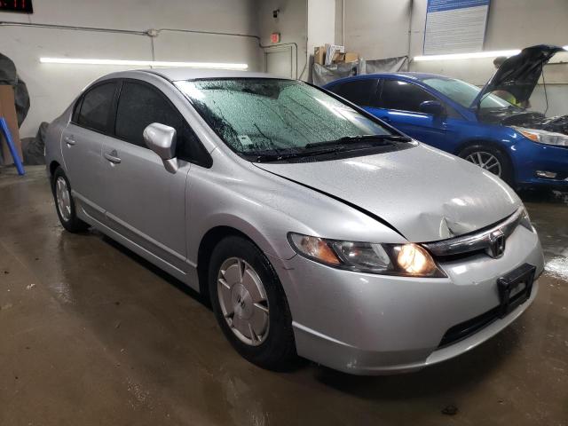 Photo 4 from auction – 2006 HONDA CIVIC HYBR with VIN JHMFA36236S020112