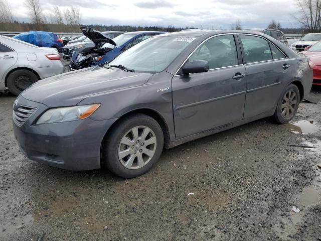 TOYOTA CAMRY HYBR 2007 with VIN JTNBB46K773028837 - Photo from auction