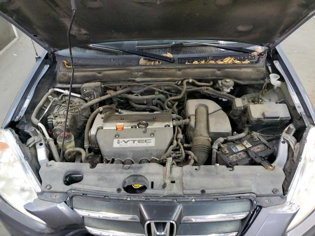 Photo 12 from auction – 2006 HONDA CR-V SE with VIN JHLRD78966C049429